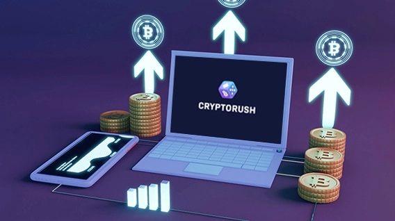 A laptop that displays the Cyrptorush website, with different crypto coins around it.